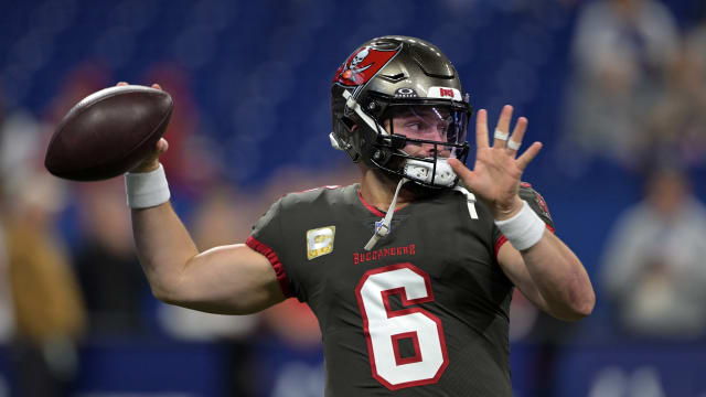 Nov 26, 2023; Indianapolis, Indiana, USA; Tampa Bay Buccaneers quarterback Baker Mayfield (6) throws a pass to warm up before the game against the Indianapolis Colts at Lucas Oil Stadium. Mandatory Credit: Marc Lebryk-USA TODAY Sports  
